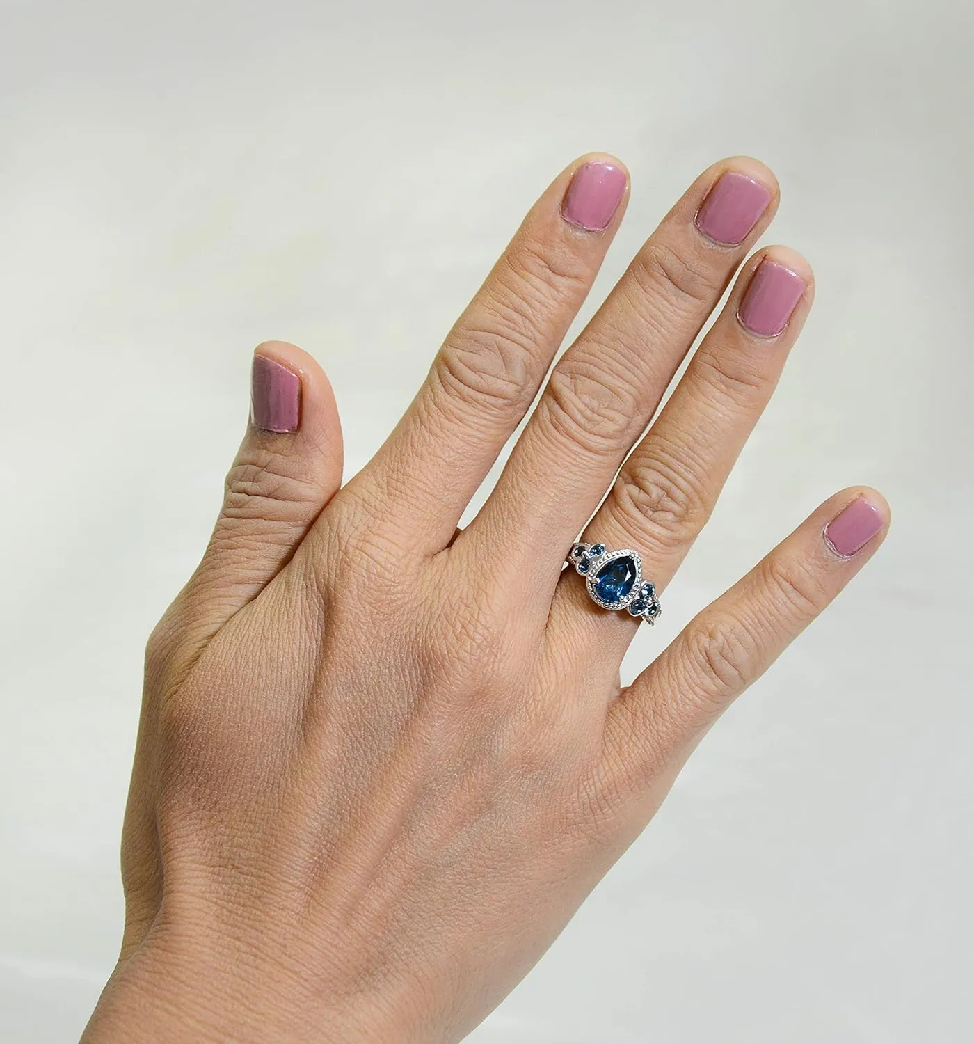 925 Sterling Silver Ring Genuine Gems Pear Shape 9x6 mm with Bezel-set Accented Gems, Rhodium-Plated Finish
